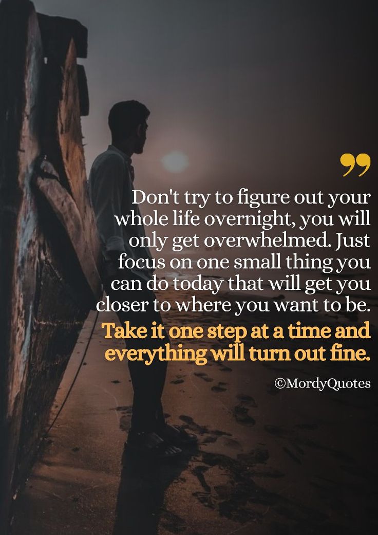 a man standing in front of a boat on the beach with a quote above it