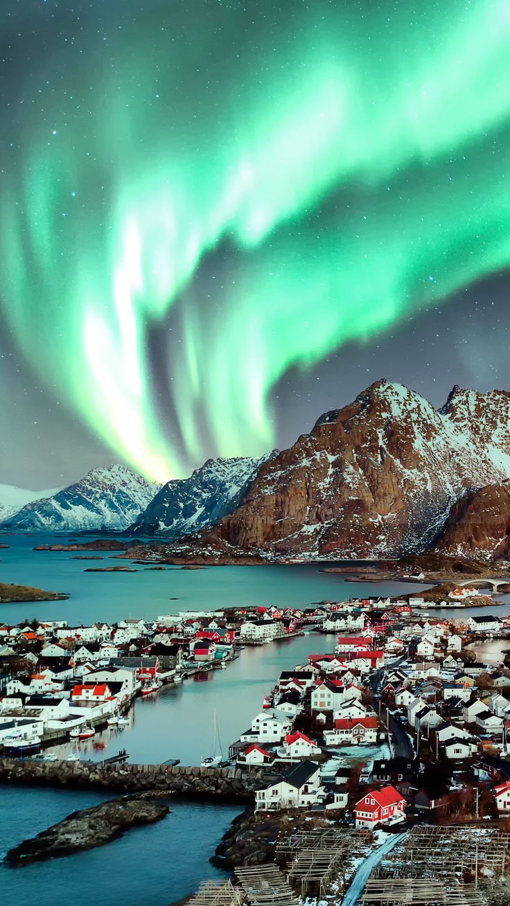 The northern lights (aurora borealis) above Henningsvaer in Lofoten, Northern Norway. Northern Europe Travel, Northern Europe Aesthetic, Norway Lights, Norway Aurora Borealis, Norway Aurora, Norway Northern Lights, Winter Northern Lights, Travel Norway, Lofoten Norway