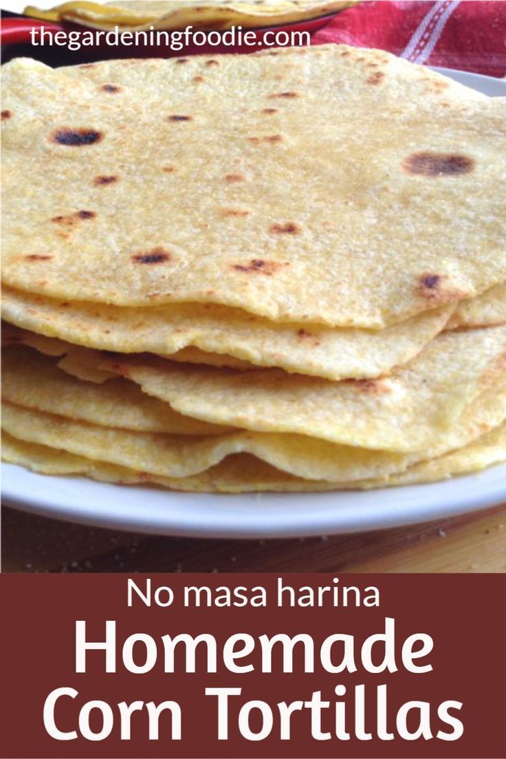 homemade corn tortillas on a plate with text overlay that reads no mas harrina homemade corn tortillas