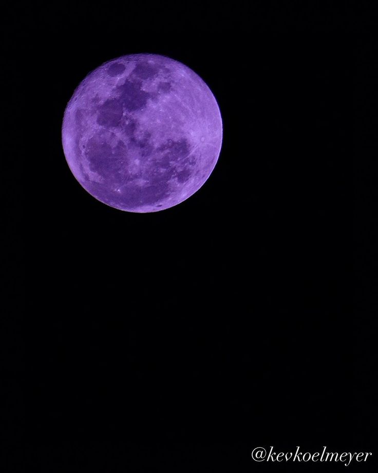 the full purple moon is seen in the dark sky