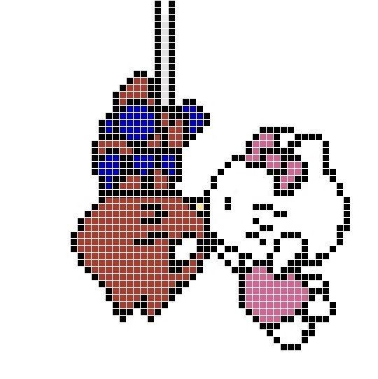 a cross stitch pattern with the shape of a heart and an animal's head