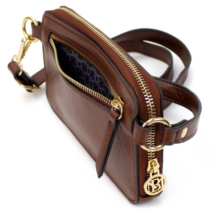 The Badgley Mischka Madalyn vegan leather belt bag is a fashionable way to go hands-free. A small pouch brightened by an elegant BM embossed pattern and metal hardware that fits a phone, cards, keys, and other small essentials. Wear it as a belt, over the shoulder, crossbody, or carried as a clutch. Product features: Belt pouch made with embossed vegan leather. Zipper closure zipped back pocket and two credit card slots. Gold hardware. Removable and adjustable belt strap with a ring clip. Colorf Phone Cards, Small Pouch, Leather Belt Bag, Belt Pouch, Small Pouches, Luggage Sets, Way To Go, Leather Zipper, Leather Pouch