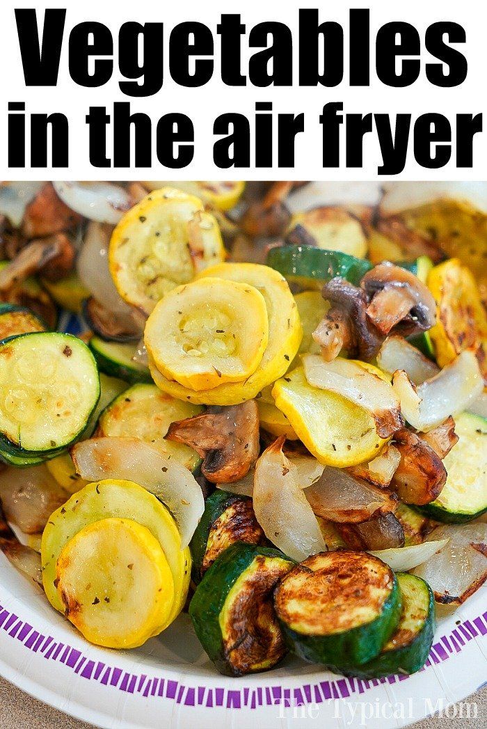 vegetables in the air fryer on a plate with text overlay that reads, vegetables in the air fryer