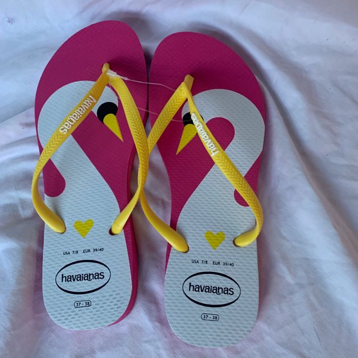 New Havaianas Yellow And Pink Flamingo Flip Flops. Never Worn, Great Condition, Women’s Size 7 *I Check Each Item As Best I Can For Any Flaws/ Imperfections But They May Be Missed. I Cannot Provide Measurements For Each Item But I Try My Best, Please Be Patient.* Yellow Fun Slip-on Sandals, Playful Slip-on Flip Flops For The Beach, Playful Flat Flip Flops For Vacation, Fun Slip-on Flip Flops For The Beach, Non-slip Fun Style Flip Flops, Fun Non-slip Slip-on Flip Flops, Fun Yellow Non-slip Sandals, Yellow Non-slip Synthetic Flip Flops, Fun Flip Flops For Beach Season