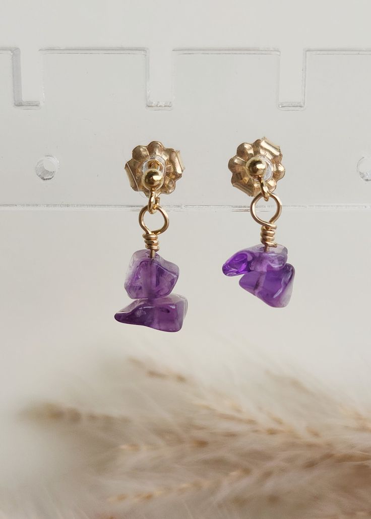 Our new faves! These 14K gold-filled wire gemstone earrings are handmade in our studio. Each earring includes a small bead with 2 gemstones hanging from it. Details-handmade in Brownsburg, Indiana -14K yellow gold-filled wire and components -colorful raw gemstone chips -gemstones approx. 3-7mm in size Gold Plated Birthstone Dangle Earrings, Dainty 14k Gold Filled Birthstone Earrings, Yellow Gold Wire Wrapped Dangle Earrings, Delicate Wire Wrapped Earrings In 14k Gold Filled, Gold Amethyst Dainty Earrings, Yellow Gold Wire Wrapped Earrings 14k Gold-filled, Wire Wrapped 14k Gold Filled Yellow Gold Earrings, 14k Gold Filled Wire Wrapped Yellow Gold Earrings, 14k Gold Wire Wrapped Dangle Earrings