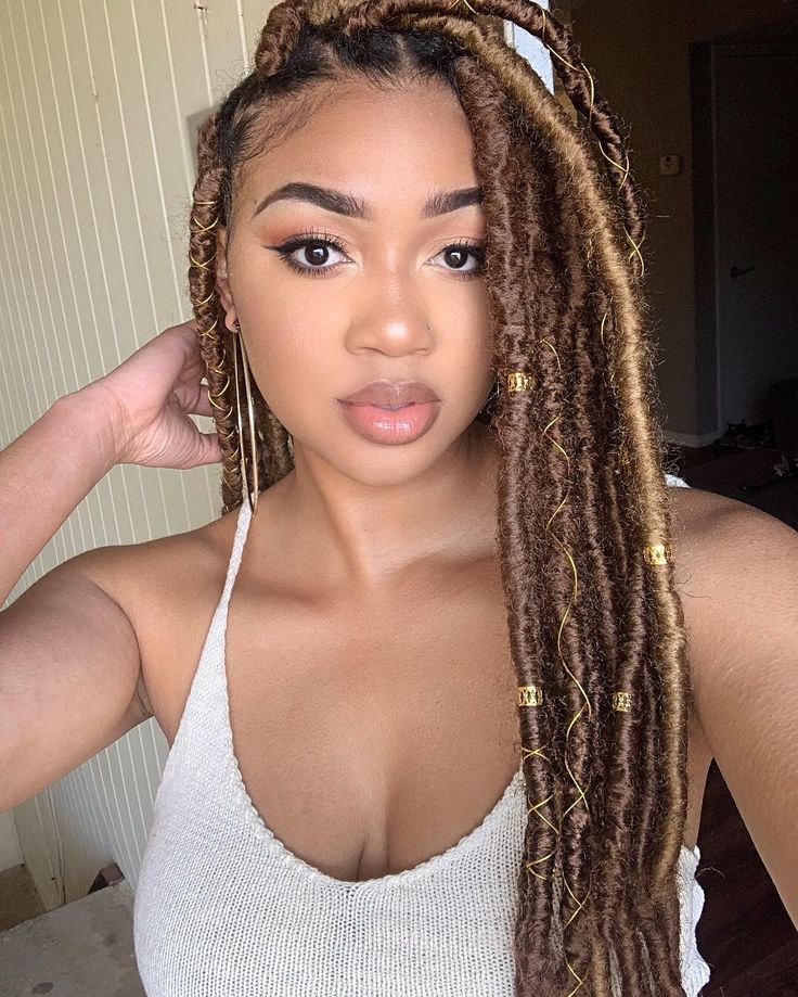 Light brown and blonde faux locs Faux Locs Hairstyles Brown, Brown Goddess Faux Locs, Brown Blonde Faux Locs, Light Brown Faux Locs Black Women, Blonde Faux Locs Styles Goddess, Light Brown Faux Locs, Brown Faux Locs Black Women, Brown Goddess Locs, Blonde Faux Locs Black Women