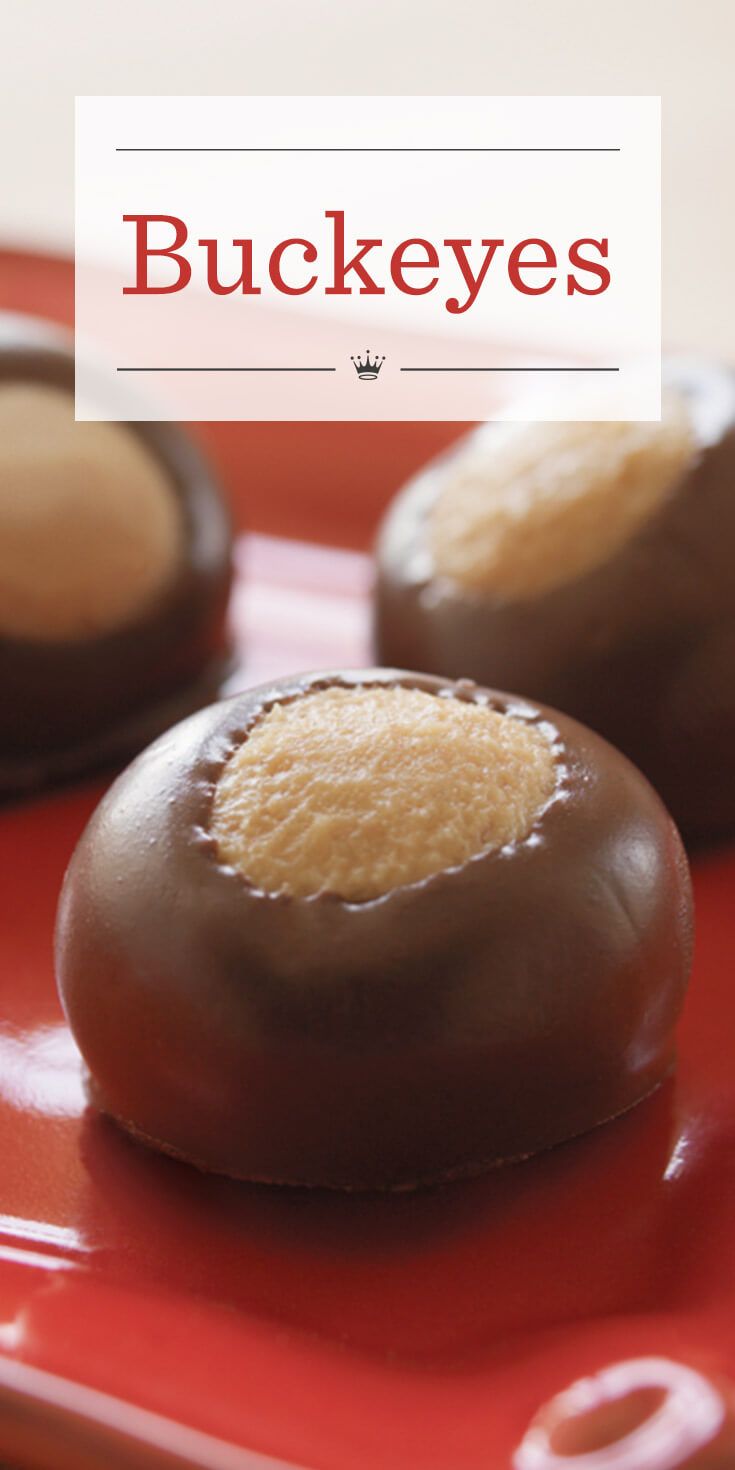 chocolate covered cookies on a red plate with the words buckeyes overlayed