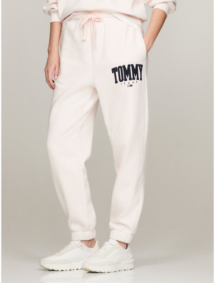 Tommy Hilfiger women's pant. Made from soft, brushed-back fleece with a clean, contemporary face and modern feel, our sweatpants are finished with a varsity-inspired Tommy logo. Part of our Tommy Jeans collection.  Material: 70% Cotton, 30% Polyester. Tommy Hilfiger Store, Cozy Sweatpants, Jeans Collection, Kids Sale, Matches Fashion, Tommy Hilfiger Women, Tommy Jeans, Womens Bottoms, Tommy Hilfiger