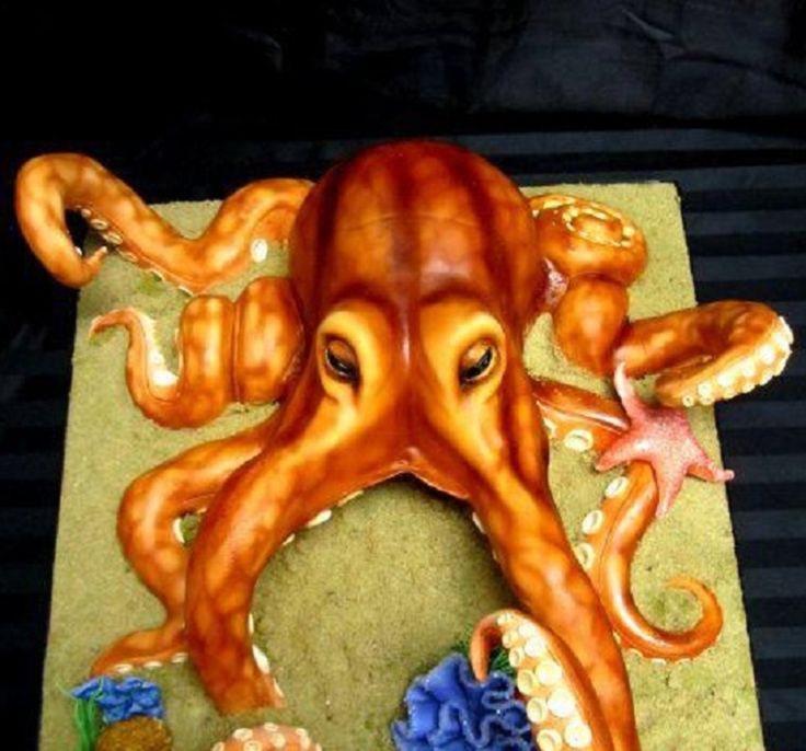 an octopus cake is on the table ready to be eaten