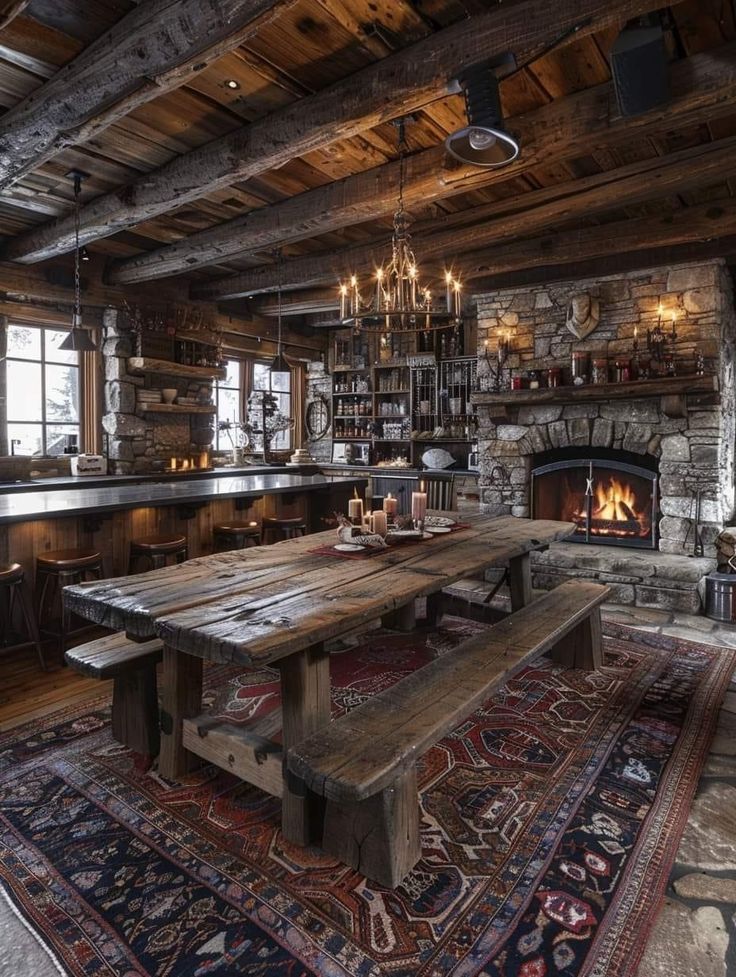 a rustic dining room with an old table and fireplace in the center, surrounded by wood paneling