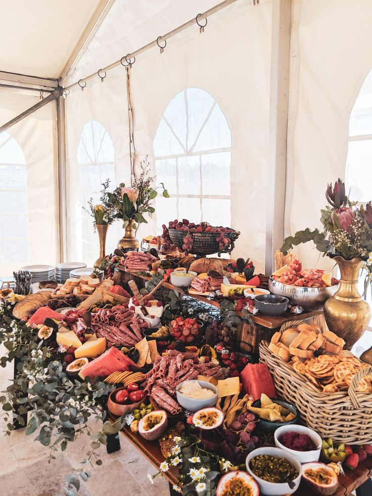 a table filled with lots of different types of food