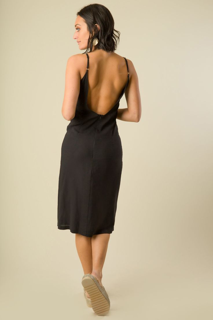 The simplest of midi length slip dresses, with the most intricately placed leg cutout. Soft, breathable, cover up your swim suit or wear it to dinner. Fit's almost form fitting, but has a little extra room to run around in. Completely open back, twisted gold beads on each strap. We’ve pushed the limits of how simple and sophisticated can actually live together. MADE IN THE USA, with international materials DETAILS -Woven breathable rayon -Cutout along the left leg to show more leg than your typi Spring Backless Stretch Slip Dress, Spring Stretch Backless Slip Dress, Stretch Backless Slip Dress For Spring, Summer Backless Dress With Built-in Bra And Low Back, Beach Slip Dress With Spaghetti Straps And Built-in Bra, Summer Evening Seamless Dresses, Fitted Backless Dress With Low Back For Vacation, Seamless Summer Evening Dresses, Seamless Evening Dresses For Summer