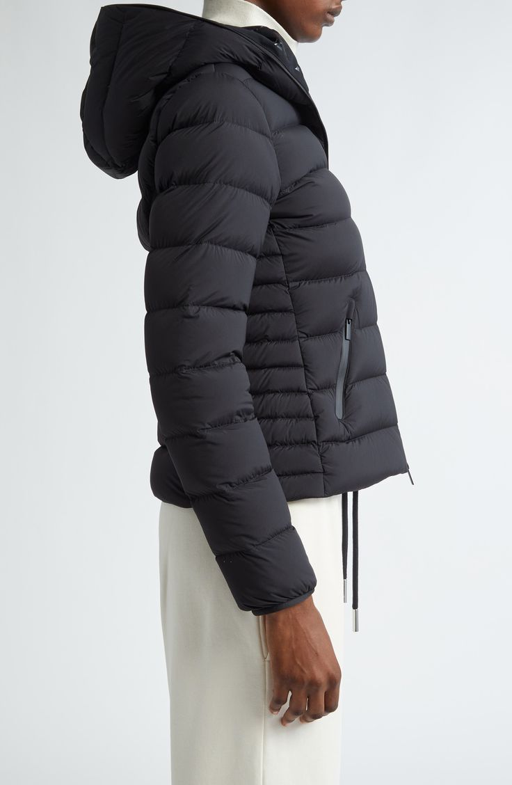 Emblematic of Moncler's Matte Black collection, this channel-quilted puffer jacket is packed with premium down and equipped with plenty of zip pockets. Two-way front-zip closure Fixed hood Vertical chest-zip pocket; front zip pockets Drawcord-toggle hem Lined, with down fill 85% polyamide, 15% elastane Dry clean Imported Designer Clothing Black Down Puffer Jacket With Zipper, Black Down Puffer Jacket With Zipper Closure, Luxury Black Puffer Jacket With Zipper Closure, Black Duck Down Outerwear With Zipper Closure, Luxury Black Puffer Jacket With Detachable Hood, Hooded Quilted Down Jacket With Zipper Closure, Black Down Puffer Jacket With Double-lined Hood, Hooded Down Quilted Jacket With Zipper Closure, Luxury Black Quilted Jacket