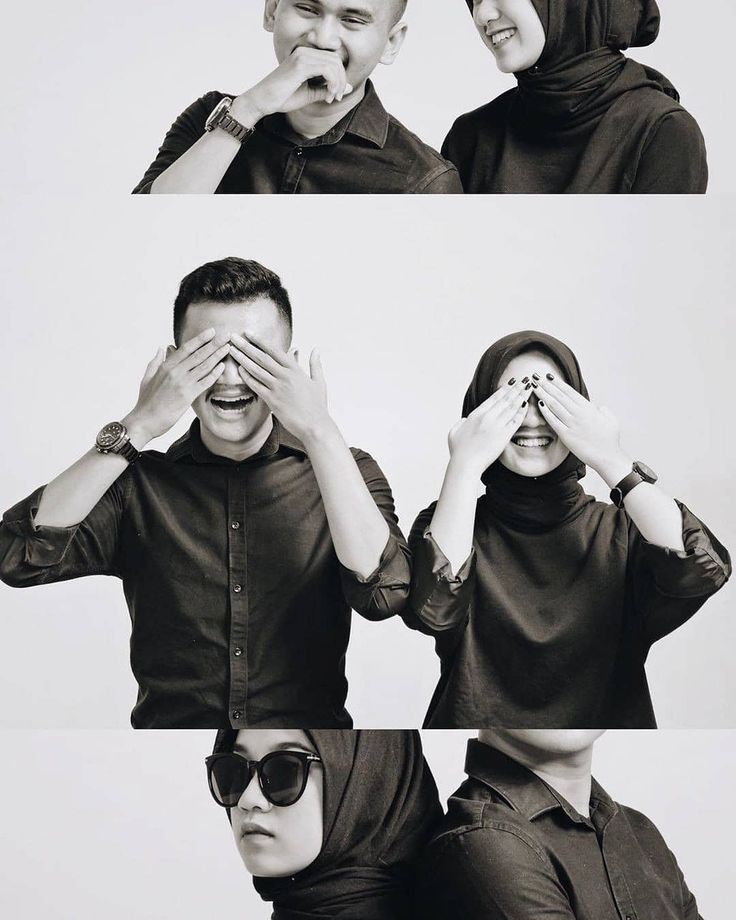 two people are covering their eyes and making faces with each other while one person covers his face