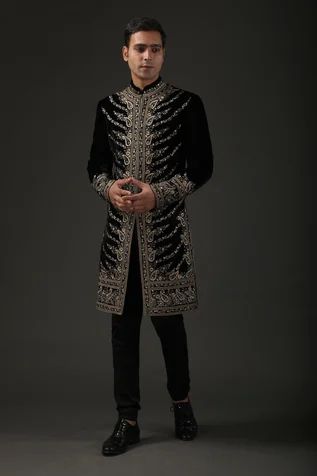 Black silk velvet sherwani with silk lining and resham embroidery in floral and paisley motifs.
Component: 1
Pattern: Embroidered
Type Of Work: Resham
Neckline: Mandarin
Sleeve Type: Full
Fabric: Silk Velvet, Lining: Silk
Color: Black
Other Details: 
Resham work
Note: Pant worn by the model is not for sale
Occasion: Groom,Wedding - Aza Fashions Black Outfit Men Wedding, Black Sherwani Groom, Reception Dress Groom, Engagement Dress Groom, Men Sherwani Wedding Indian Groom, Sherwani Black, Men Sherwani Wedding, Sherwani Groom Wedding, Velvet Sherwani