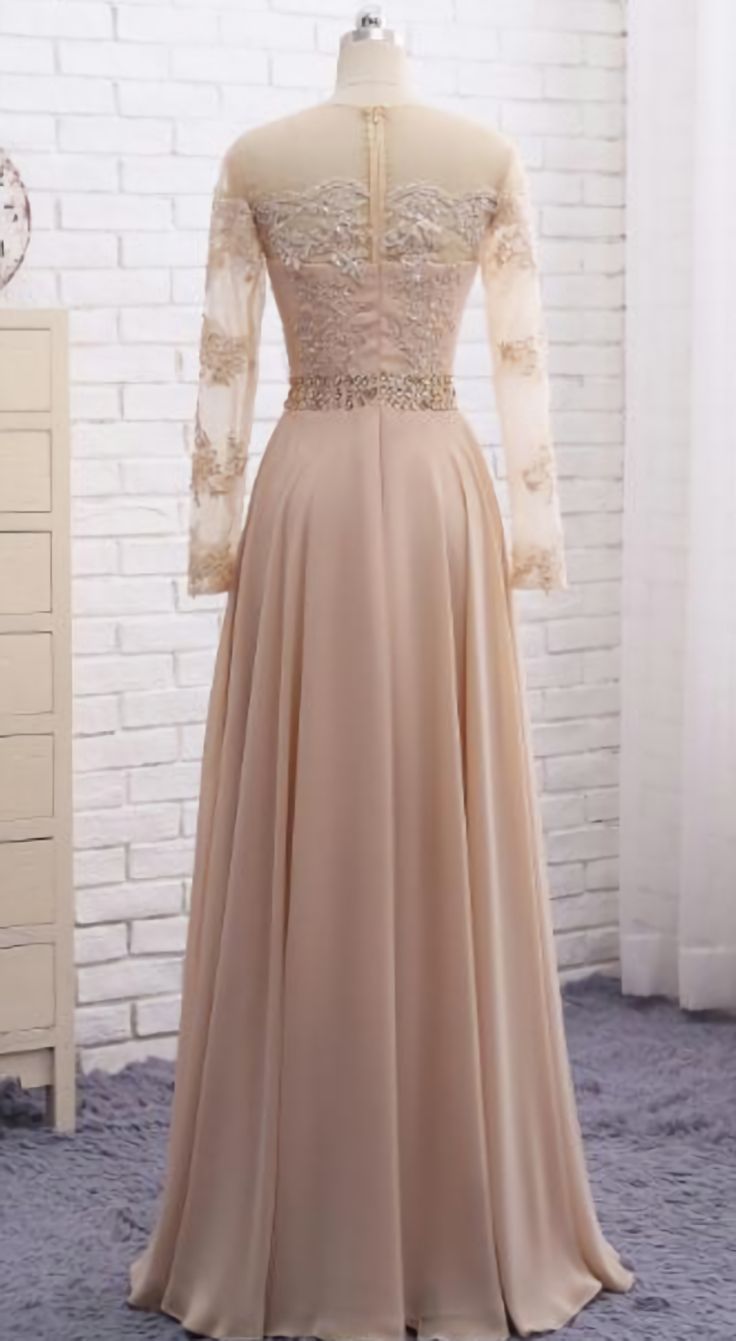 فساتين السهرة الشمبانيا طويلة الأكمام Cocktail Gown With Sheer Long Sleeves, Elegant Long Sleeve Evening Dress With Lace Sleeves, Floor-length Cream Dress For Banquet, Cream Floor-length Dress For Banquet, Beige Floor-length Dress For Banquet, Cocktail Gown With Long Sleeves, Cocktail Long Sleeve Gown, Elegant Cream Prom Dress, Elegant Long Sleeve Dress With Lace Sleeves For Evening