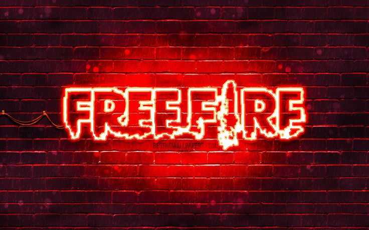 the word free fire is lit up against a brick wall in neon red and yellow