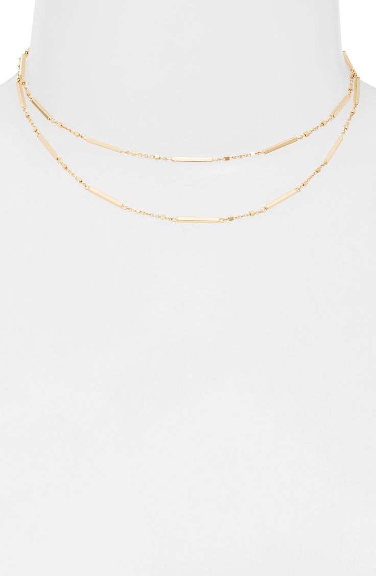 The 18-karat-gold plate brings shimmering light to this double-chain necklace that complements both casual and elevated looks. 14" shortest length; 16" longest length 18k-gold plate Imported Latinx Owned/Founded Gold Double Strand Figaro Chain Necklace, 14k Gold Double Strand Chain Necklace, Modern Double Strand Gold Chain Necklace, Modern Multi-strand Gold Jewelry, Double Strand Layered Necklace In Yellow Gold, Gold Double Strand Layered Necklace For Formal Occasions, Gold Double Strand Layered Necklace, Elegant Double Strand Chain Choker, Gold Plated Double Strand Chain Necklace