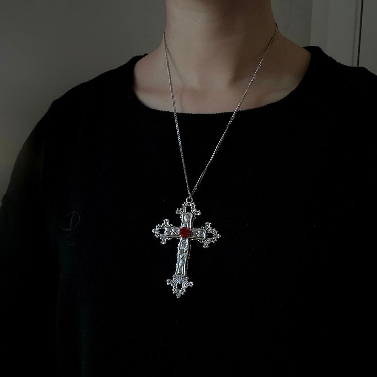 This silver gothic cross necklace showcases a large vintage cross pendant, reflecting grunge jewelry aesthetics, making it a bold statement piece perfect for her. It's an ideal religious jewelry gift idea for those who appreciate distinctive and edgy accessories. 𝐃𝐄𝐓𝐀𝐈𝐋𝐒:  ⭐️ Necklace lengths available 14" 16" 18' 20" 22" 24" ⭐️ Pendant size is 3" ⭐️ The large silver cross pendant is silver plated over alloy. The chain necklace is up on stainless steel, safe for those with sensitive skin Big Cross Necklace, Big Silver Necklace, Gothic Cross Necklace, Big Cross, Grunge Jewelry, Edgy Accessories, Cross Necklaces, Gothic Cross, Gothic Crosses