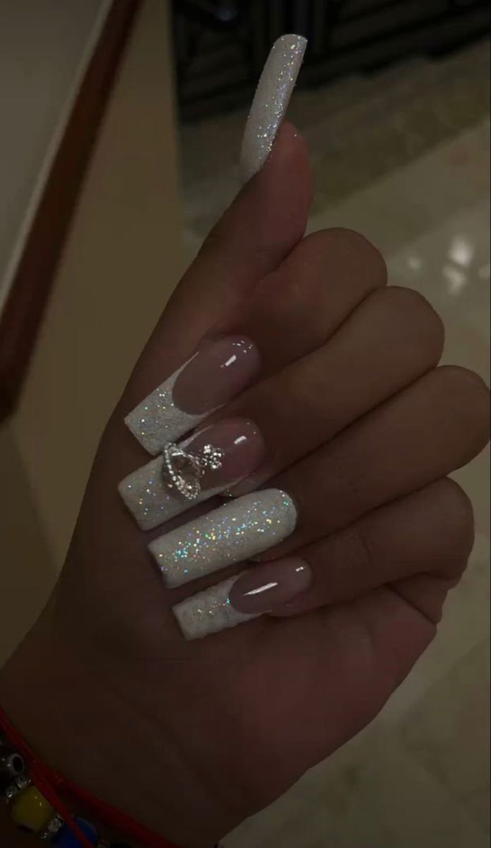 White French Tip Nails Coffin Glitter, Gems On Acrylic Nails, Vivienne Westwood Nail Designs, Prom Nails White Glitter, Prom Nails Long Acrylic, Cute Short Prom Nails, White French Tip Vivienne Westwood Nails, French Tips With One Glitter Nail, Cute Nails Gems