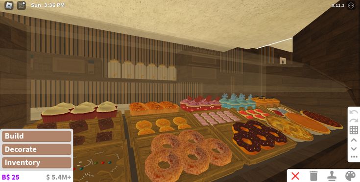 a virtual view of an assortment of donuts and pastries on display in a bakery