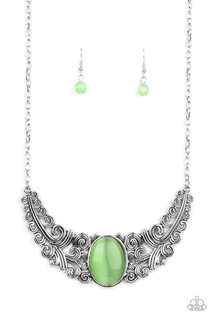 Featuring vine and floral details, leafy silver frames branch out from an oversized green cat's eye stone center, creating a dramatically whimsical centerpiece below the collar. Features an adjustable clasp closure. Sold as one individual necklace. Includes one pair of matching earrings. Whimsical Centerpiece, 3d Jewelry, Cats Eye Stone, Silver Frames, Paparazzi Accessories, Moonstone Necklace, Eye Stone, Green Item, Green Necklace