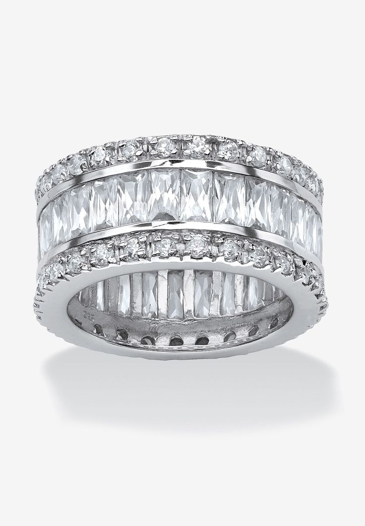 a white gold ring with three rows of baguettes