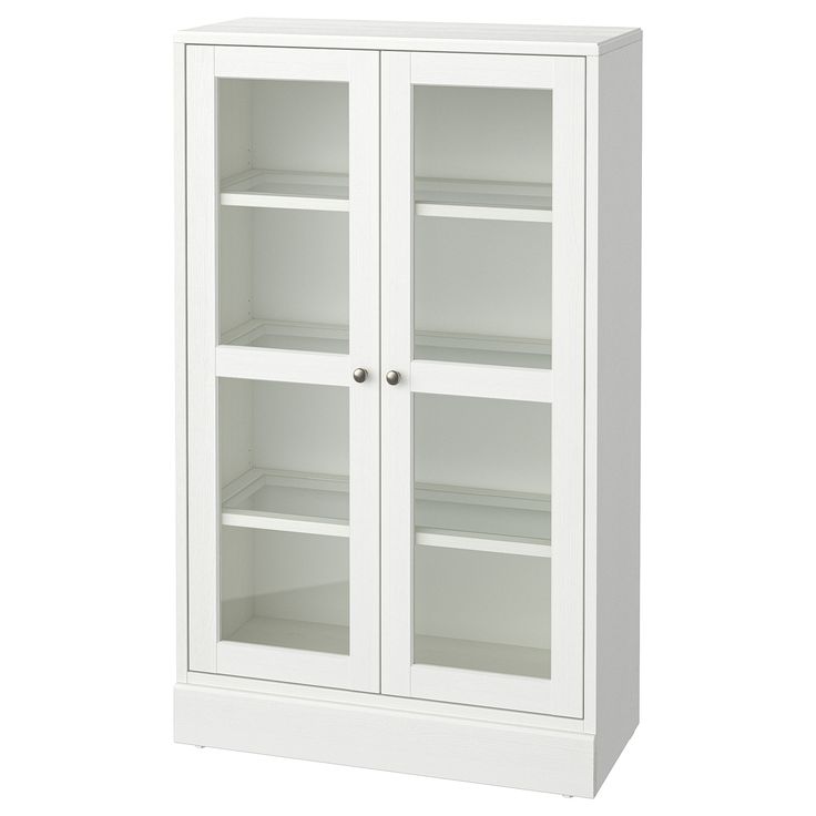 a white cabinet with glass doors on the front and bottom shelves, both closed up