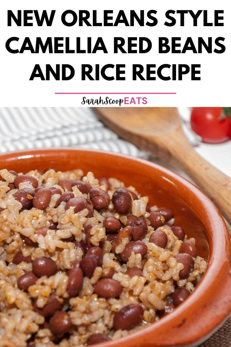 a bowl filled with rice and beans on top of a table