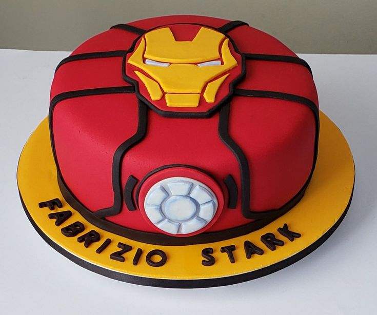 a birthday cake that is shaped like iron man