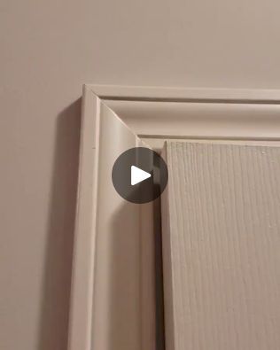 an open door with a video showing how to fix the handle on it's side