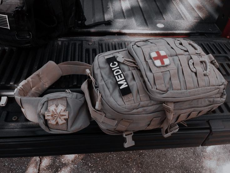 a medical bag sitting on the back of a truck