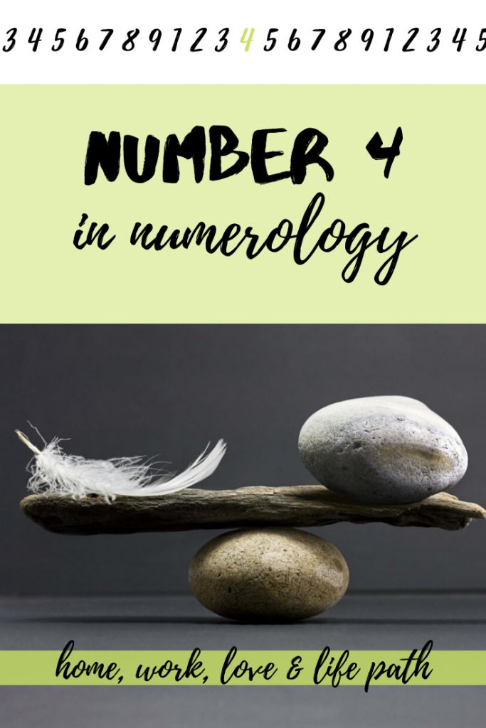 the number 4 in numereology is displayed with two rocks and a feather on top