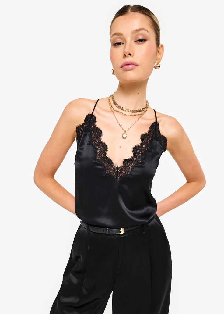 V-neckline, featuring a scallop lace trim Adjustable racerback straps Fulled lined Black Lace Trim V-neck Top, Scalloped Lace Sleeveless Camisole, V-neck Lace Trim Top For Night Out, Elegant Lace Tank Top With Straps, Party Cami Tank Top With Lace Trim, V-neck Lace Top With Lace Trim For Night Out, Chic Camisole With Contrast Lace, Lace Trim Camisole For Night Out, Black Lace V-neck Camisole