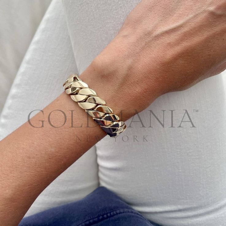 "All Our Bracelets Are Made Of REAL 14K GOLD   Stand out with this unique 14mm thick Miami Cuban Bracelet featuring a box lock clasp   14K Yellow Gold Miami Cuban Chain Bracelet, 14mm Thick, 7.5\" Inch, Real Gold Bracelet, Women  Shop our 14K Bracelets https://www.etsy.com/shop/GOLDMANIA?ref=seller-platform-mcnav§ion_id=26925987  Shop On Sale items https://www.etsy.com/shop/GOLDMANIA?ref=seller-platform-mcnav§ion_id=1  Metal: 14K Yellow Gold    Width: 14 MM  Length: 7.5 IN  Closure: Box Weight: Luxury Bracelets With Chunky Cuban Link Chain, Luxury Cuban Link Bracelet With Chunky Chain, Luxury Gold Bracelet With Chunky Chain, Luxury Thick Band Bracelets For Formal Occasions, Luxury Gold Bracelet With Chunky Chain For Formal Occasions, Luxury Formal Gold Bracelet With Chunky Chain, Gold Bracelet Women, Real Gold Bracelet, Cuban Chain Bracelet