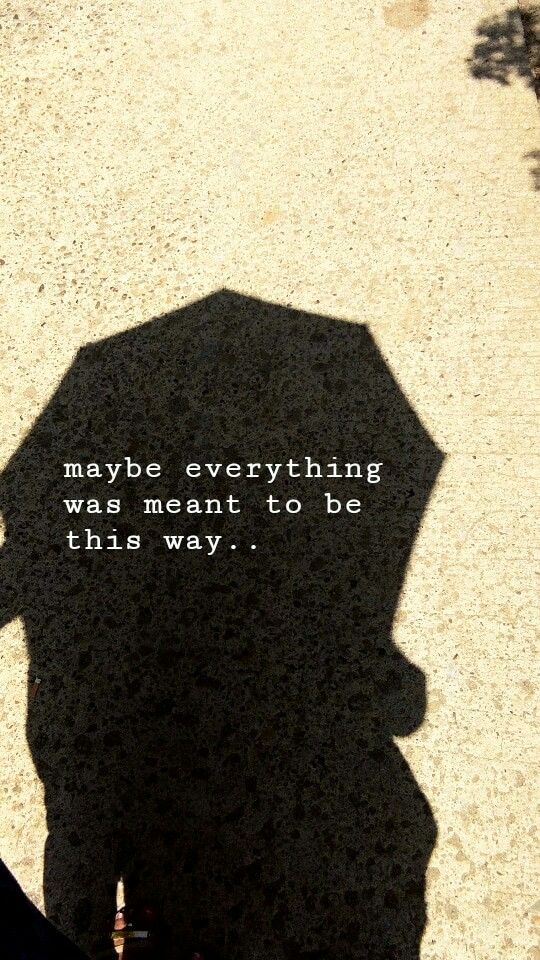 the shadow of a person holding an umbrella with a quote on it that says maybe everything was meant to be this way