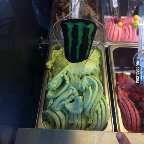 a display case filled with different types of desserts