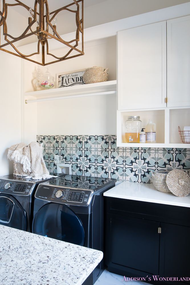 a washer and dryer in a small room