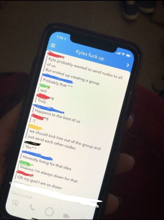 someone is holding their cell phone with text on it