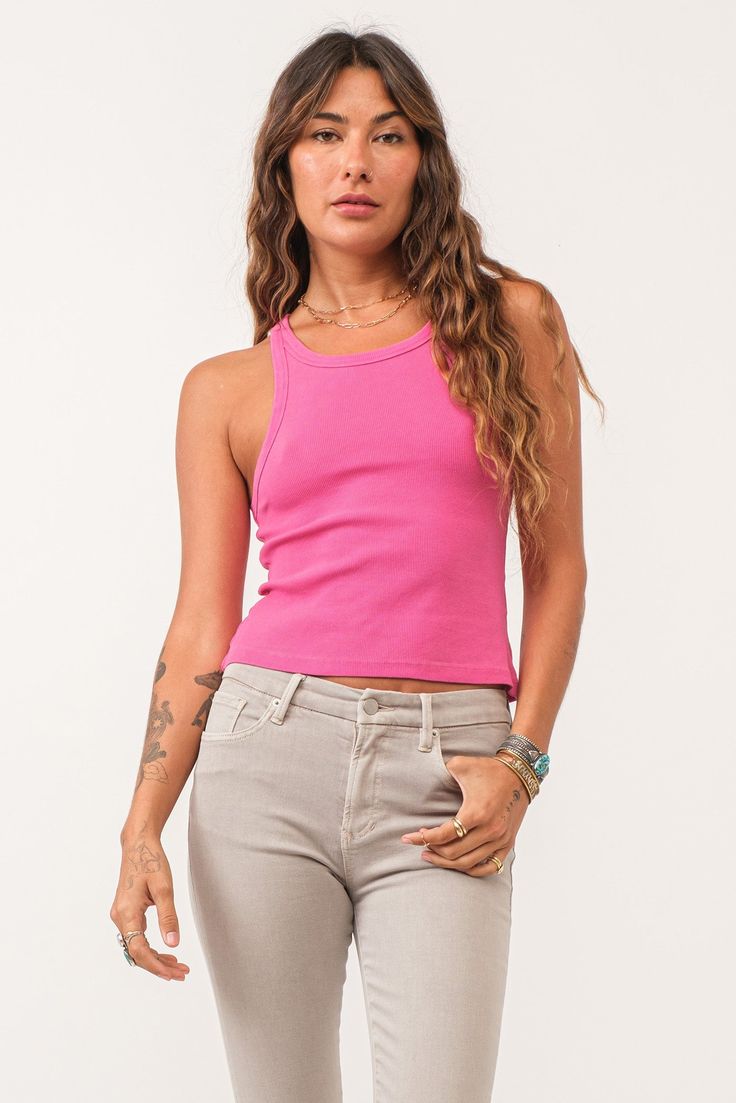 image of a female model wearing a TAMIA CROPPED RACER TANK PINK FLASH DEAR JOHN DENIM Pink Fitted Crew Neck Tank Top, Pink Racerback Tank Top For Spring, Sporty Ribbed Crew Neck Tank Top, Pink Racerback Tank Top For Summer, Pink Stretch Athleisure Tank Top, Pink Crew Neck Tank Top For Spring, Pink Stretch Tank Top For Athleisure, Spring Pink Crew Neck Tank Top, Spring Crew Neck Tank Top In Athleisure Style