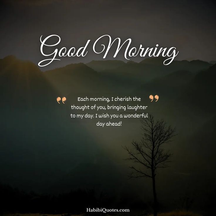 a quote on good morning with a tree in the foreground and mountains in the background