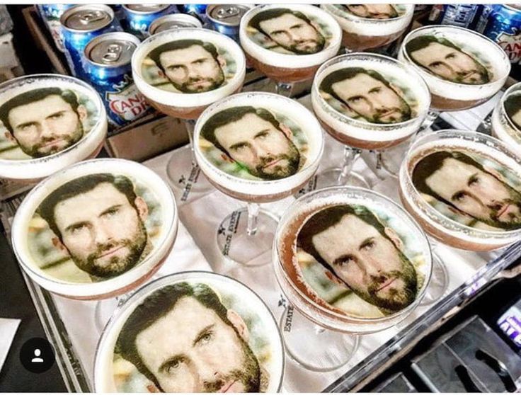 many cups with pictures of the same man on them