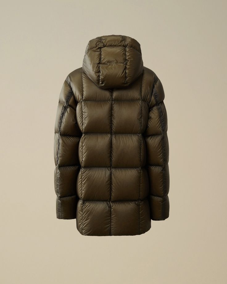 Hooded long down jacket crafted in D.D. Shell, a micro-ripstop opaque 7 denier nylon. The lightness and transparency of the fabric emphasise the structure of the garment. Direct Down Injection process. Long Down Jacket, Country Shop, C P Company, The C, The Godfather, Waist Bag, Down Jacket, Coats Jackets, Shells