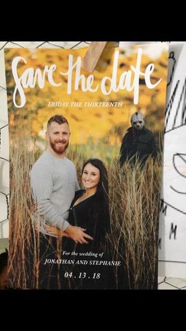 the save the date card is hanging on a wire fence in front of an image of a man and woman