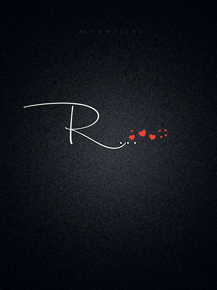 the word r is written in white ink on a black background with red heart shapes