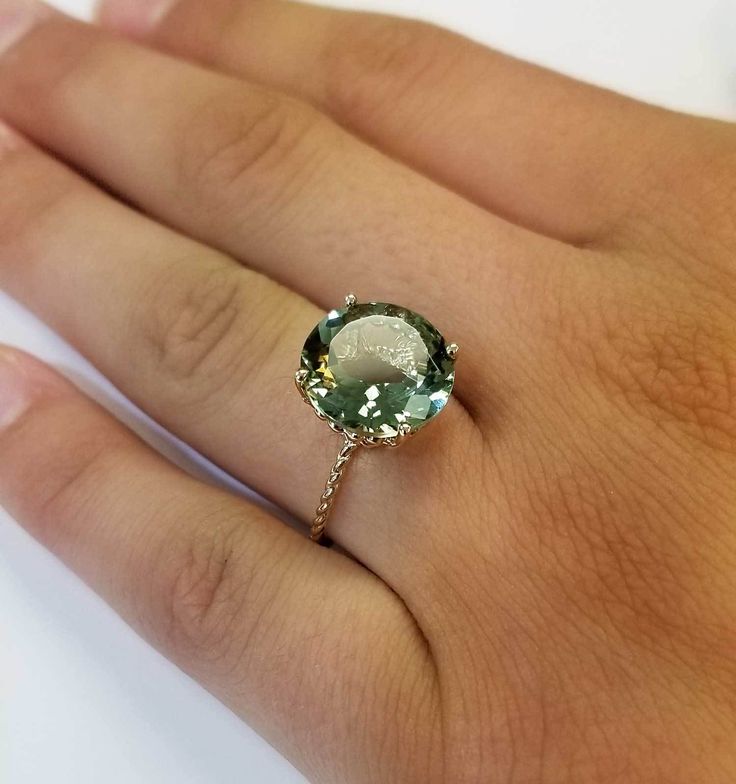 Luxury Green Amethyst Ring With Accent Stones, Elegant Green Topaz Ring With Round Cut, Elegant Green Topaz Ring, Round Cut, Elegant Green Topaz Round Cut Ring, Elegant Green Round Cut Topaz Ring, Elegant Green Oval Topaz Ring, Elegant Green Oval Amethyst Ring, Green Diamond Topaz Ring, Green Topaz Ring With Diamond Accent