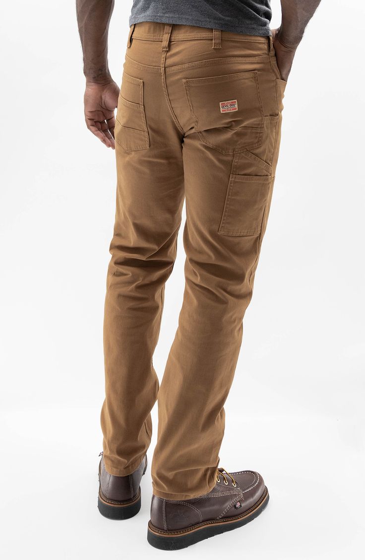 Both durable and soft, these carpenter pants made of breathable cotton sport a touch of stretch and a look that works hard across your casual wardrobe. 16" leg opening; 11" front rise Five-pocket style; tool pockets 98% cotton, 2% spandex Machine wash, tumble dry Imported Work Pants For Men, Best Work Pants, Utility Pockets, Carpenter Pants, Pants For Men, Dungarees, Work Pants, Tumble Dryer, Casual Wardrobe