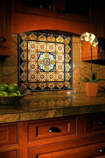 an image of a kitchen scene with apples on the counter and a potted plant