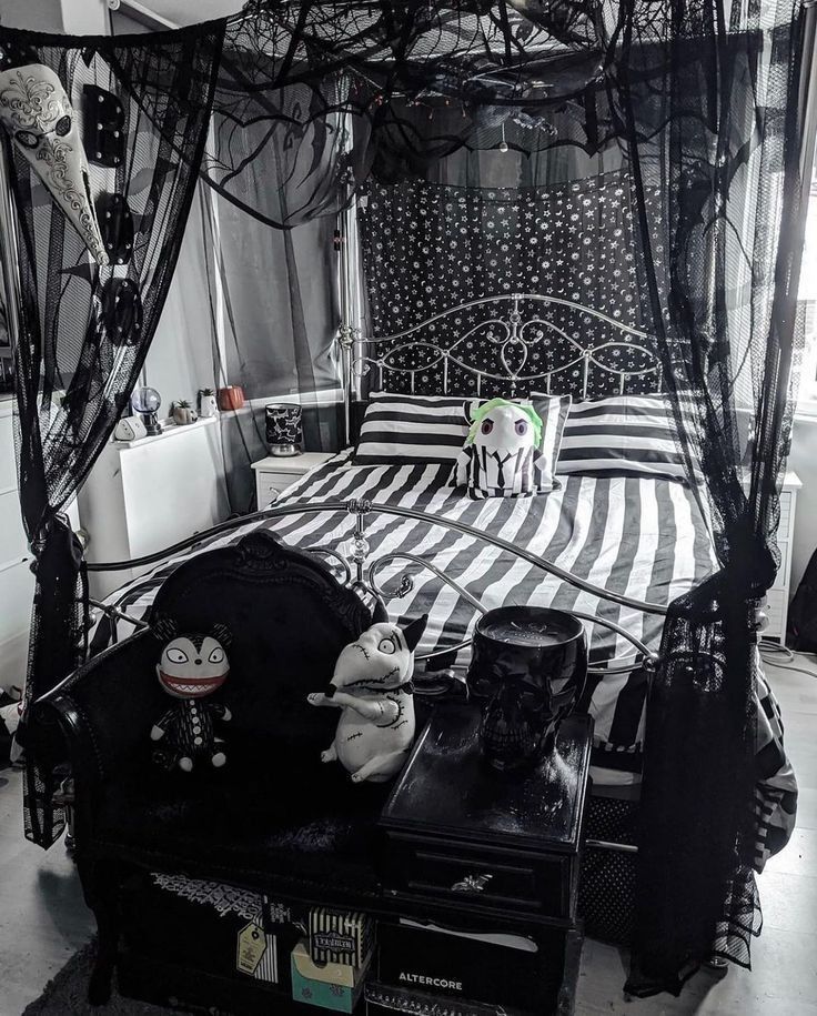 a black and white bedroom with lots of decorations