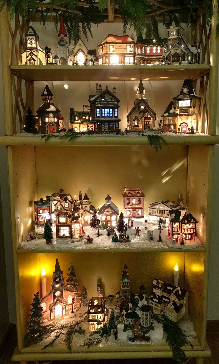 a shelf filled with lots of christmas decorations